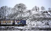 A Northern Rail train in the snow.