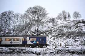 A Northern Rail train in the snow.