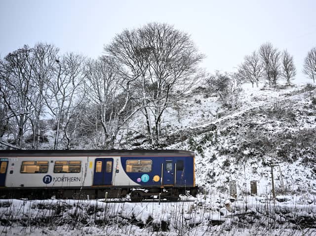 A Northern Rail train in the snow.