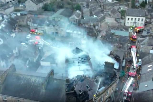 Man in his 40s dies after fire rips through house on Main Street in ...