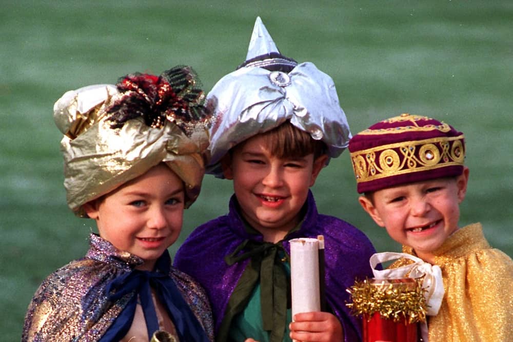 Euxton CE Primary School pupils Joe Parry, Ceyan Crossthwaiate and Dale Cunningham bring gifts  in the schools Christmas Nativity Play, entitled 'It's A Baby' 