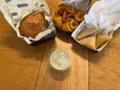 The Beef Up Smash Burger, Curly Fries and Chicken Somosa from YAMM takeaway