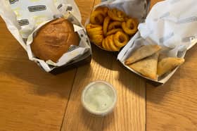 The Beef Up Smash Burger, Curly Fries and Chicken Somosa from YAMM takeaway