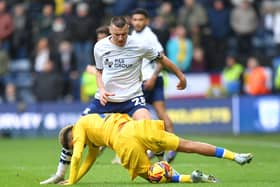 Preston North End's Milutin Osmajic battles with Leeds United's Jayden Bogle