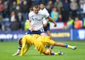 Preston North End's Milutin Osmajic battles with Leeds United's Jayden Bogle