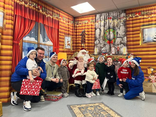 Children meeting Father Christmas at EFL House