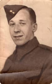 With his cap at a jaunty angle, Lawrence Dunnagan poses for a wartime
photograph.