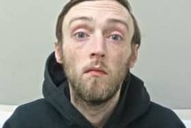 James Donnelly targeted a store three times in just a week and assaulted a worker has been jailed