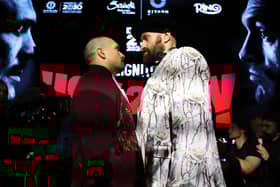 Tyson Fury (R) and Oleksandr Usyk face off ahead of their IBF, IBO, WBA, WBC and WBO Undisputed World Heavyweight Title fight this weekend. Credit: Richard Pelham/Getty Images