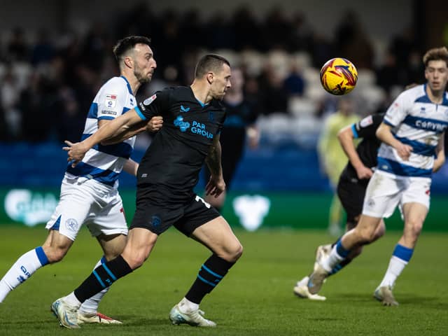 Milutin Osmajic (centre) keeps his eye on the ball 