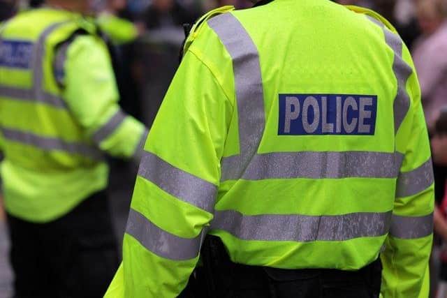 A man has been charged after £400 worth of products were stolen from two stores in West Lancashire