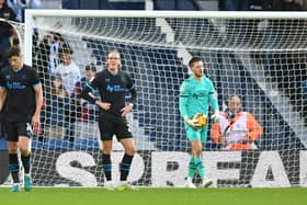 Dejected PNE players after WBA score their third goal