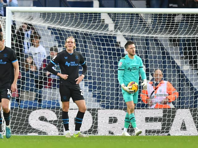 Dejected PNE players after WBA score their third goal