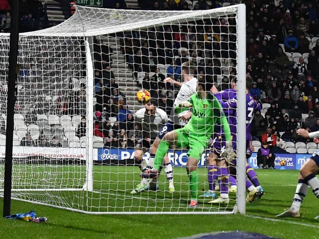 Preston North End's Will Keane scores