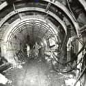 An archive photo showing workers building the original Haweswater Aqueduct water tunnel system