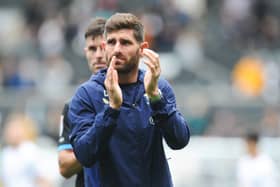 Preston North End's Ched Evans applauds the fans at the final whistle 