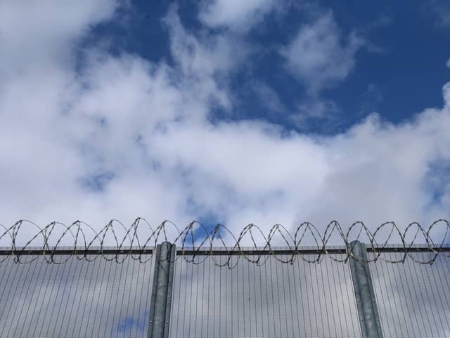Drones dropping drugs and weapons to dangerous prisoners being held in high-security jails are a "threat to national security", a watchdog has warned