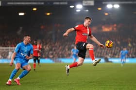 Mark McGuinness of Luton Town blocks