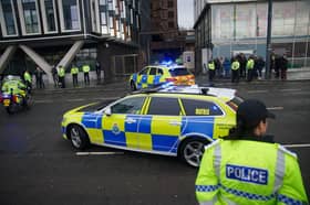 Police escort a prison van believed to contain Axel Rudakubana arriving at Liverpool Crown Court for his sentencing after he admitted the murders of three girls at a dance class in Southport