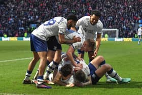 Preston North End's Emil Riis is mobbed