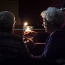 Holocaust survivors Lady Milena Grenfell-Baines MBE and Liesel Carter BEM are helped to light the World Peace Flame candle by Lord Mayor Councillor Abigail Marshall Katung (right) during a Holocaust Memorial Day event in Leeds. A Holocaust Memorial Day is taking place at Cutlers' Hall in Sheffield on Monday, January 27, from 5.30pm to 7pm. Photo: Danny Lawson/PA Wire 