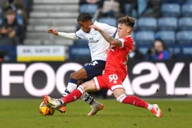 Preston North End's Jayden Meghoma battles with Middlesbrough's Ben Doak
