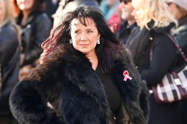 Loose Women panellist Coleen, 59, wiped a tear from her eye as she approached the church