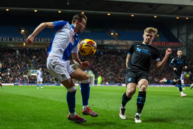 Preston North End's Ali McCann blocks the cross from Blackburn Rovers' Ryan Hedges