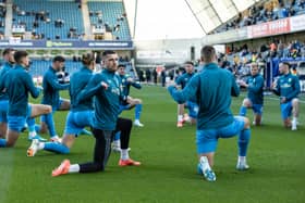 Preston North End players warming 