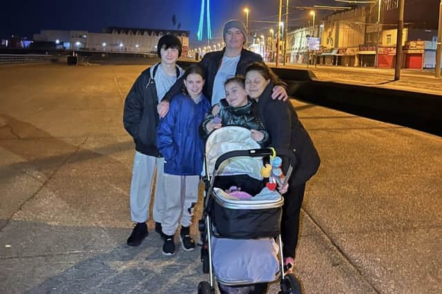 Ariya and her family pictured during their one final late-night trip to see the sand and stars in Blackpool.