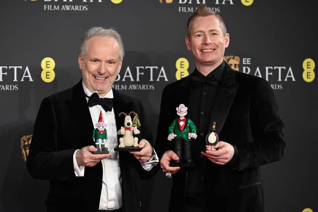 Nick Park and Merlin Crossingham attend the 2025 EE BAFTA Film Awards at The Royal Festival Hall. (Photo by Kate Green/Getty Images)