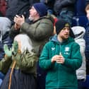 Preston North End fans watch their team in action
