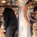 The Golden Retriever arrives at the bride and groom with the ring.