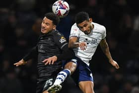 Preston North End's Kaine Kesler-Hayden battles with Swansea City's Myles Peart-Harris