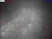 M61 traffic stopped after a coach caught fire