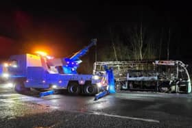 The coach was carrying more than 30 children as well as teachers when it caught fire on an M60 slip road