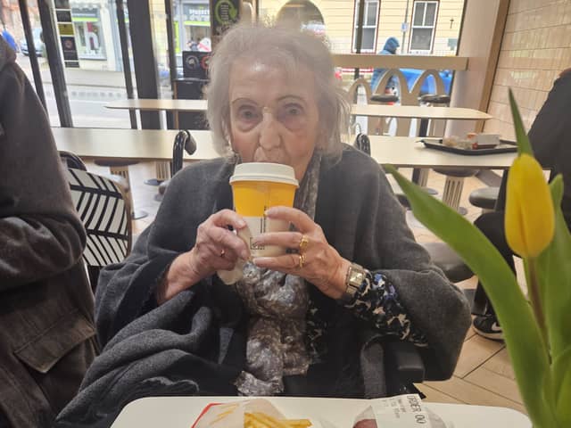 95-year-old Betty Timmis with her first ever McDonald's meal. 