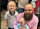 Danny Bend, with stepdaughter Lottie and his little boy, is raising funds for Poppy Atkinson's family