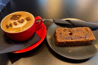 Regular Coffee and a date and walnut slice at the Hive cafe in Blackpool.