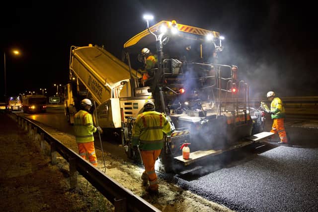 Working hard to ensure the motorway is road worthy.