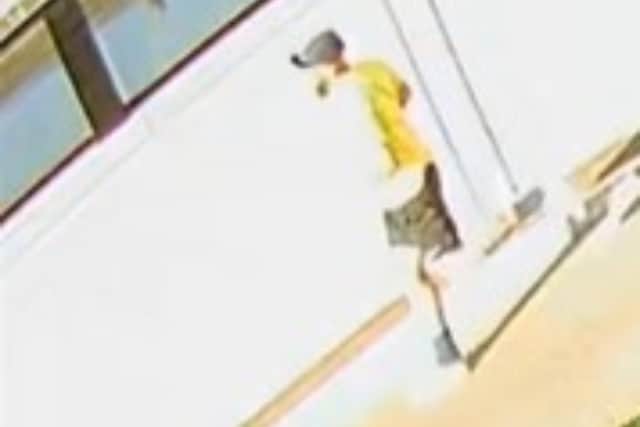 Officers want to speak to this man after a pensioner was attacked while walking his dog in Penwortham