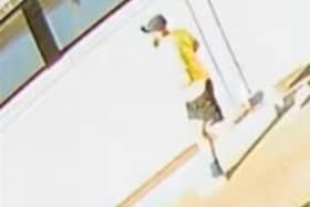Officers want to speak to this man after a pensioner was attacked while walking his dog in Penwortham