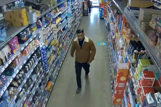 A woman in her 70s suffered a “serious hip injury” after she was attacked at a Co-op store in Waterfoot