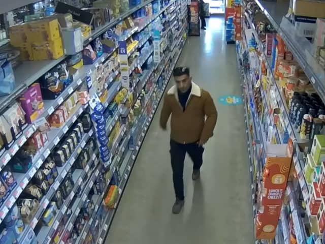 A woman in her 70s suffered a “serious hip injury” after she was attacked at a Co-op store in Waterfoot
