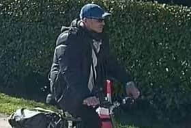 Officers want to speak to this man after a woman’s handbag was stolen in Penwortham