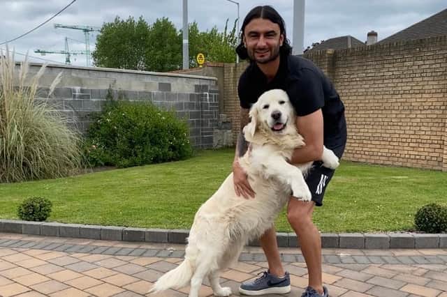 Neil with his adorable dog Alfie who WellPaws is mirrored on.