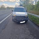 Police have released this image to show the shocking aftermath of a drunk driver's collision with a skip wagon on the M61.