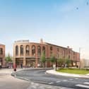 An image of how the completed Blakey Moor development will look with the former Subway building on the left