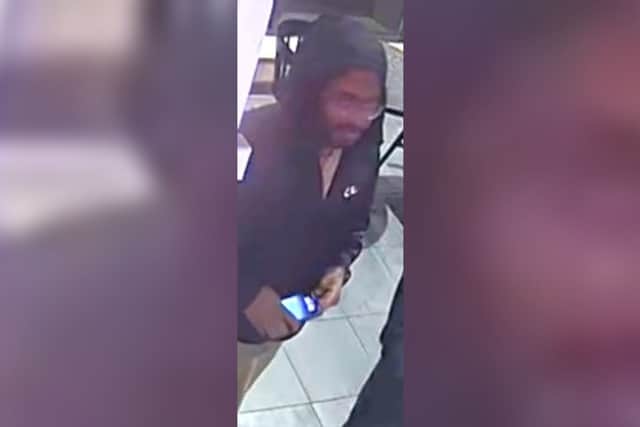 Officers want to speak to this man in connection with an attack outside a KFC in Lancaster city centre