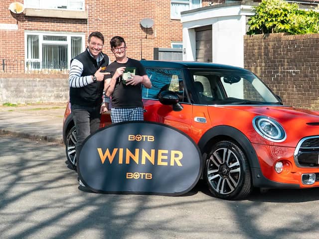 Andrew Heal woke up to see a familiar face at the door - and then he was given a massive prize